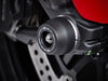 The front wheel of the Ducati Scrambler Nightshift featuring EP Front Spindle Bobbins crash protection, one half of the EP Spindle Bobbins Paddock Kit. 