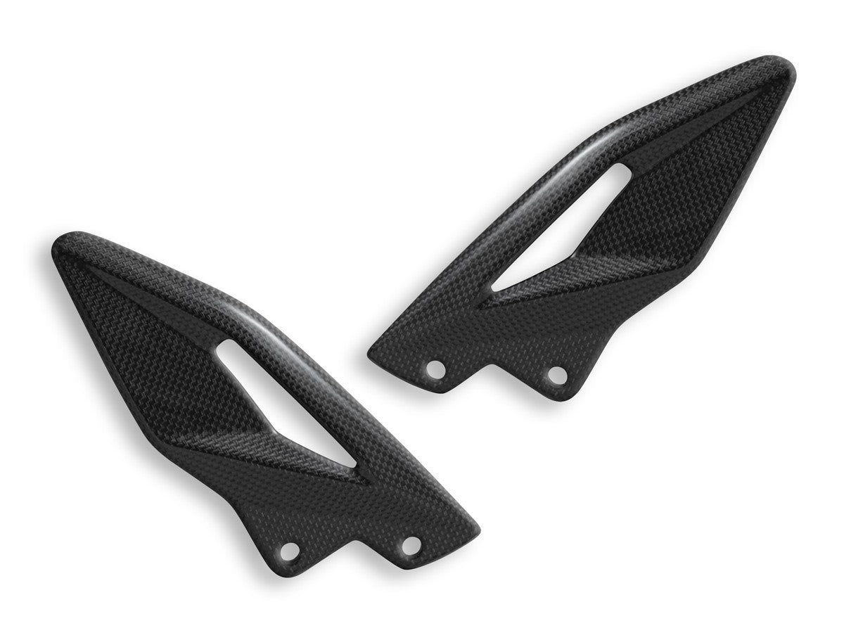 CRB90L - TRIUMPH STREET TRIPLE GLOSSY CARBON HEEL GUARDS - DBK Special Parts - 1