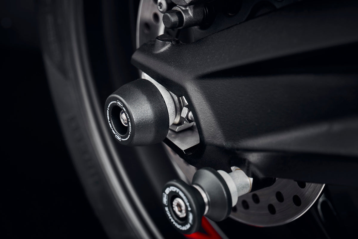 Evotech Performances signature spindle bobbin crash protection fitted to protect the rear wheel and swingarm of the Triumph Street Triple S (660).