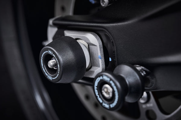 Evotech Performances signature spindle bobbin crash protection installed to protect the rear wheel and swingarm of the Triumph Tiger Sport 660.