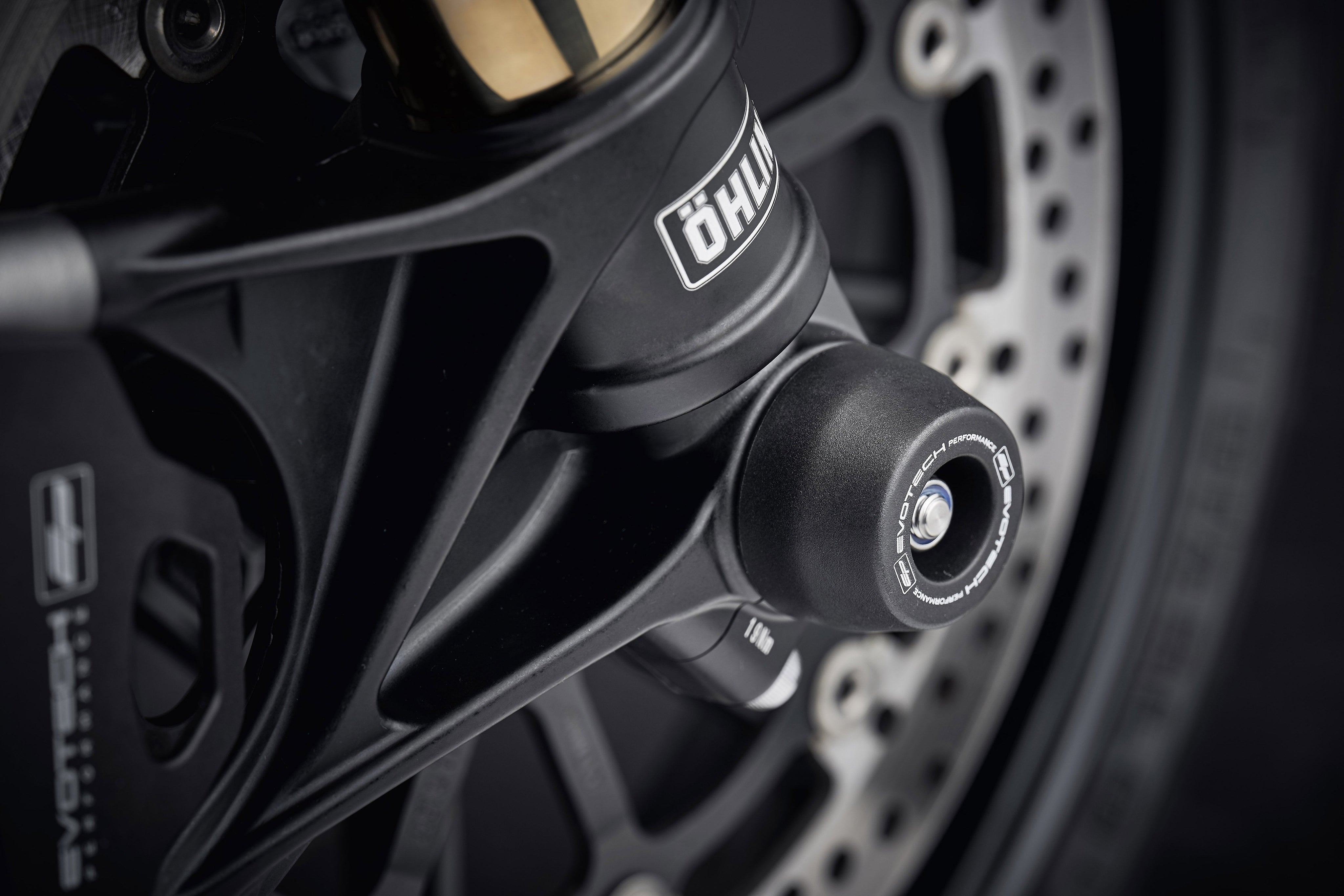 The offside front wheel of the Ducati Streetfighter V4 SP with EP Spindle Bobbins Crash Protection fitted.