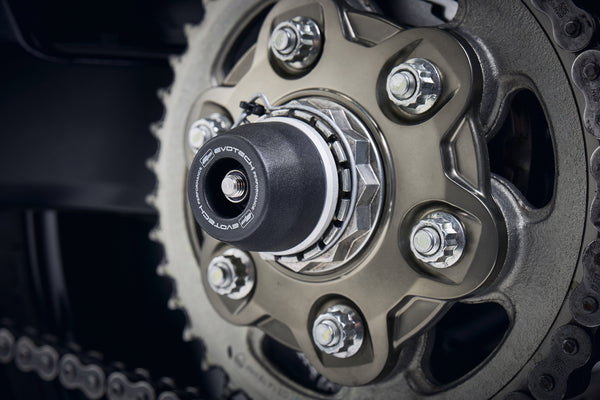 The signature Evotech Performance spindle bobbin fitted to the rear wheel of the Ducati Multistrada V4 Pikes Peak, offering crash protection to the swingarm and chain.