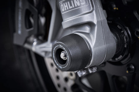 The front wheel, fork and brake caliper of the Ducati Multistrada V2 S with an EP crash protection spindle bobbin precisely fitted.