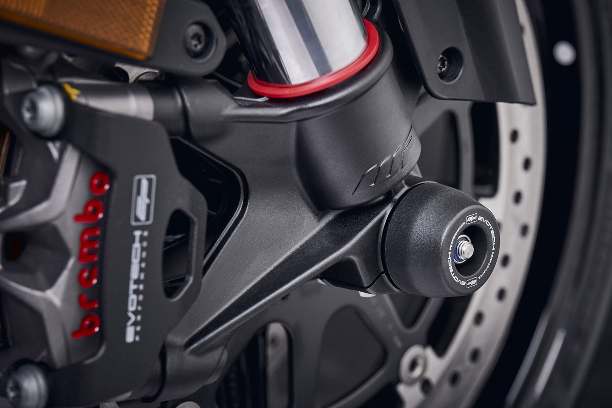 The injection-moulded nylon crash bung of EP Front Spindle Bobbins installed onto the front wheel of the KTM 1290 Super Duke RR, giving strong crash protection to the front forks and brake calipers.