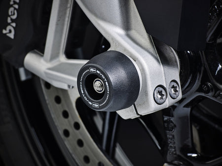 An EP spindle bobbin from EP Spindle Bobbins Kit seamlessly fitted to the front wheel of the BMW S 1000 XR, protecting the front fork and brake calipers.