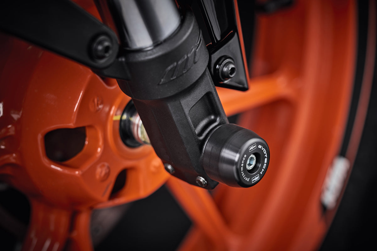 EP Front Spindle Bobbins for the KTM 125 Duke: Evotech Performances crash protection bungs seamlessly fitted to the motorcycles front forks.