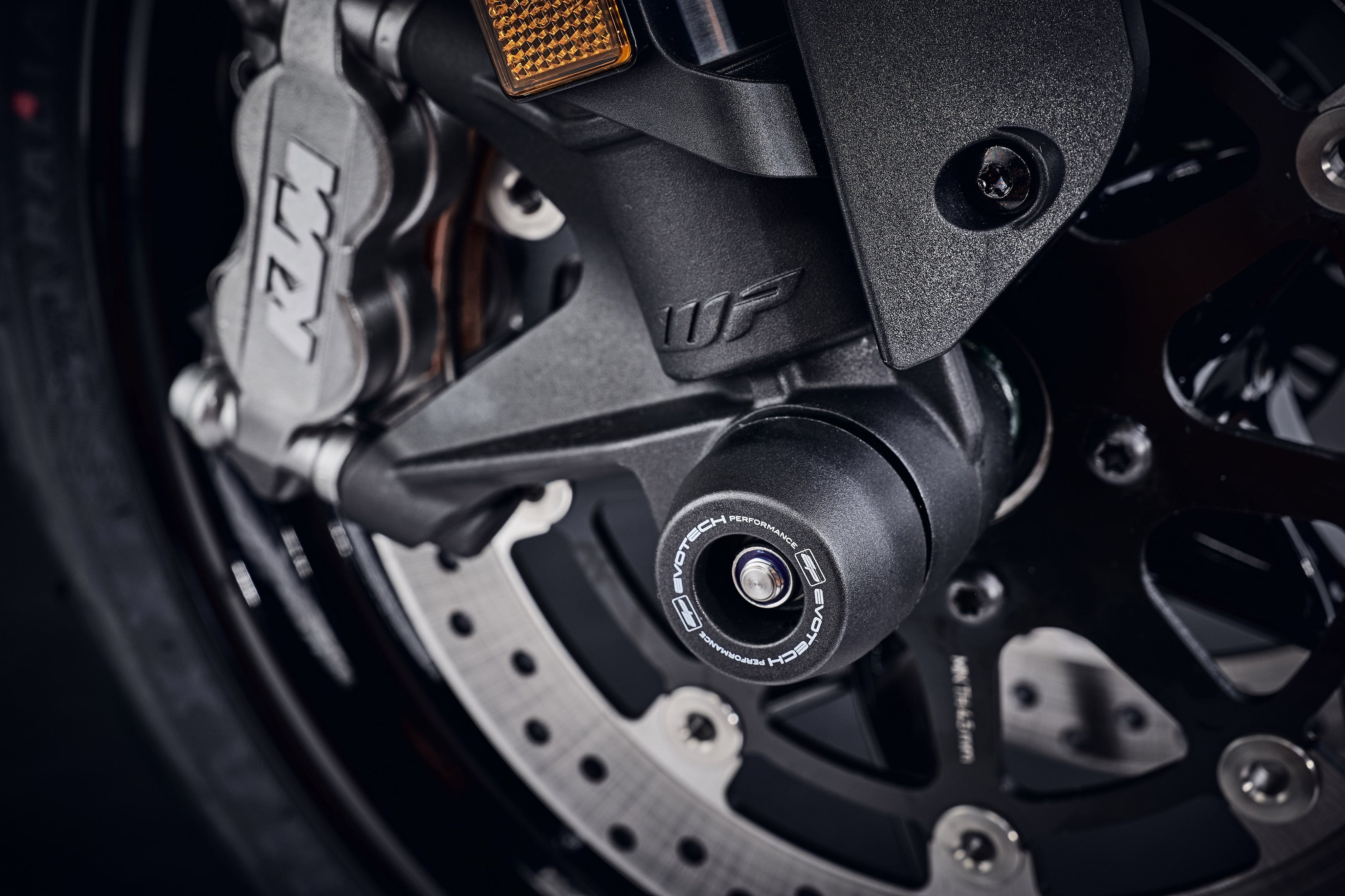 EP Front Spindle Bobbins fitted seamlessly to the KTM 890 Duke R, extending from the front forks for superior crash protection.