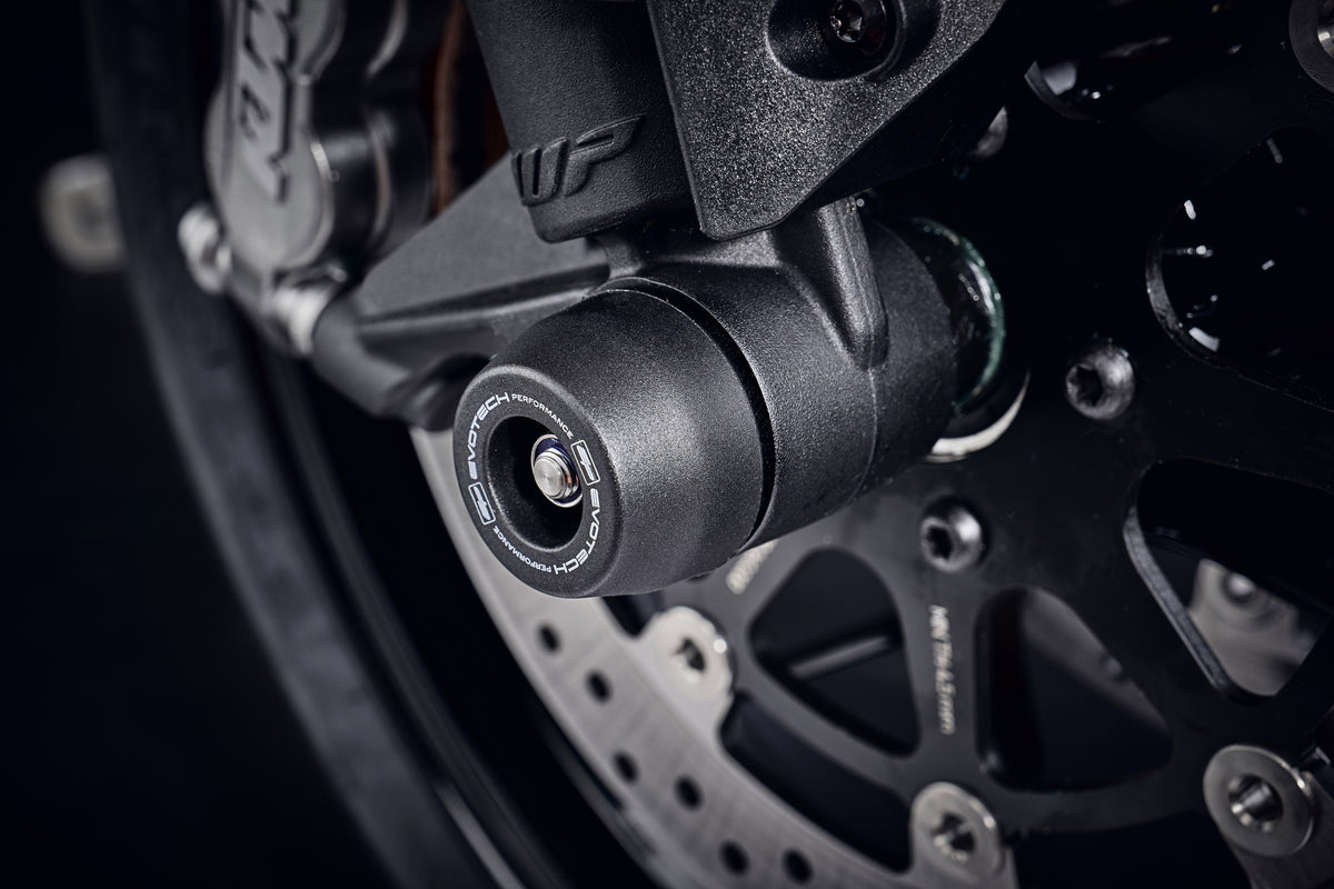 The injection-moulded nylon crash bung of EP Front Spindle Bobbins installed onto the front wheel of the KTM 890 Duke R, giving strong crash protection to the front forks and brake calipers.