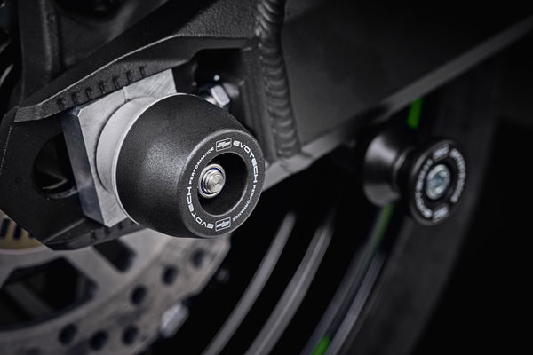 The rear wheel of the Kawasaki Z900RS Café Performance with EP Spindle Bobbins Crash Protection bobbin mounted to the rear spindle offering swingarm protection. 